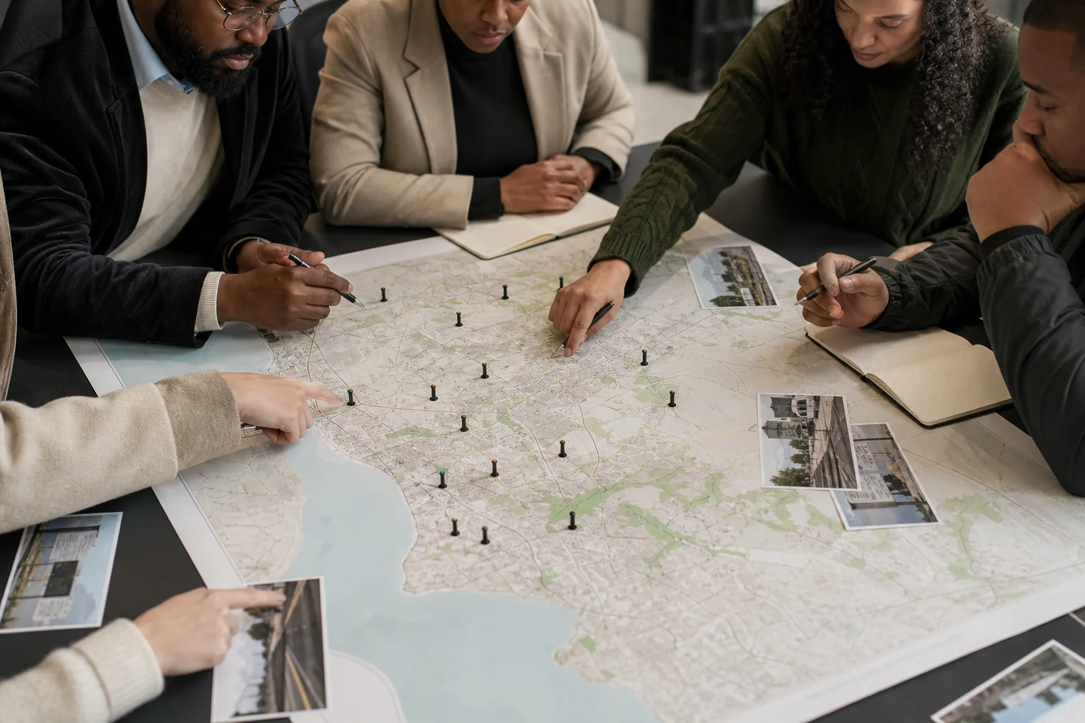 Strategic planners mapping outdoor advertising locations across Cape Town